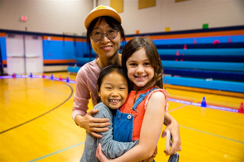 Students and families participate in a fun run